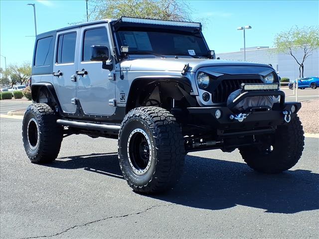 used 2018 Jeep Wrangler JK Unlimited car, priced at $23,999