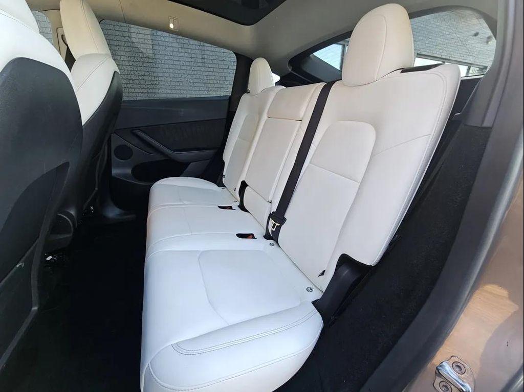 used 2025 Tesla Model Y car, priced at $41,999