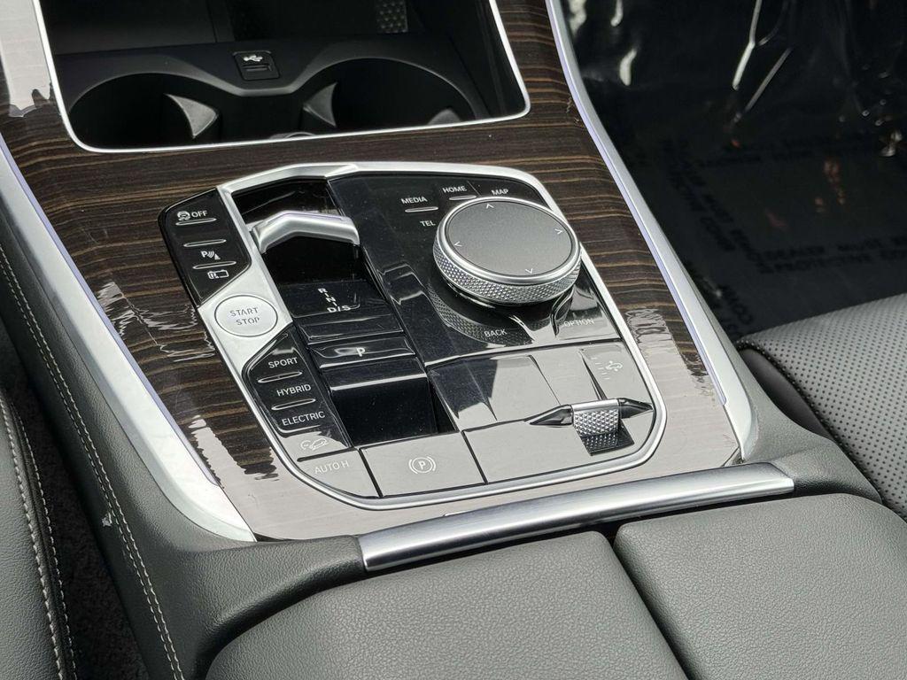 used 2024 BMW X5 PHEV car, priced at $58,300