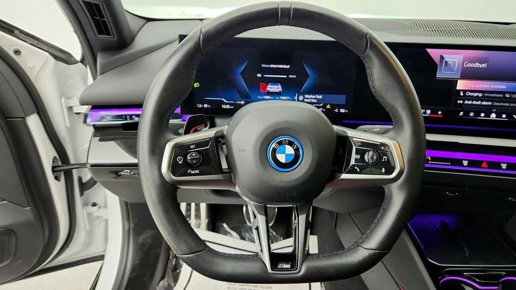 used 2025 BMW i5 car, priced at $62,995