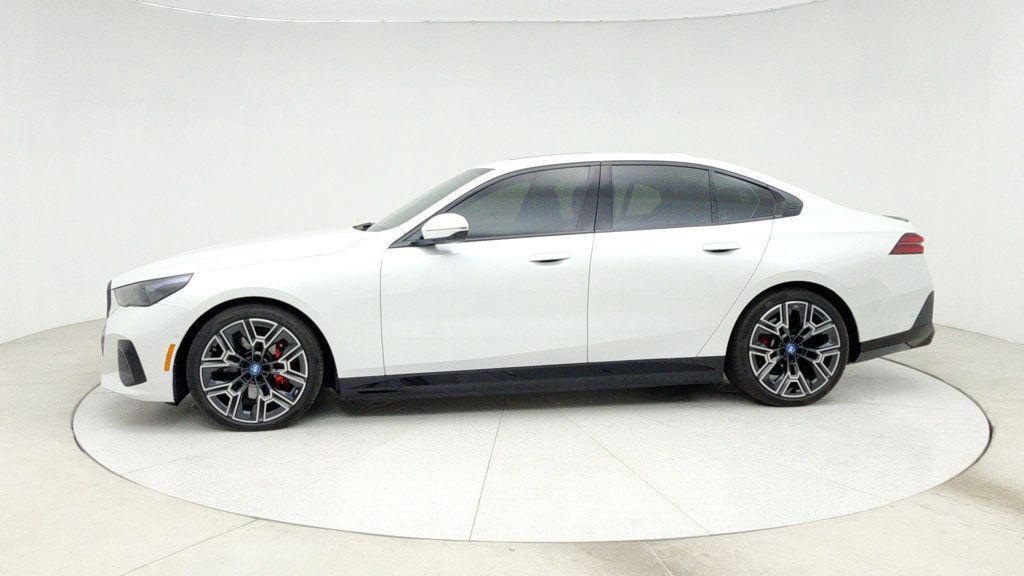 used 2025 BMW i5 car, priced at $61,995