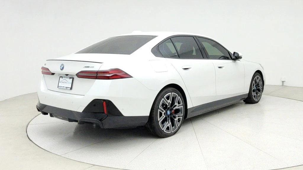 used 2025 BMW i5 car, priced at $62,995