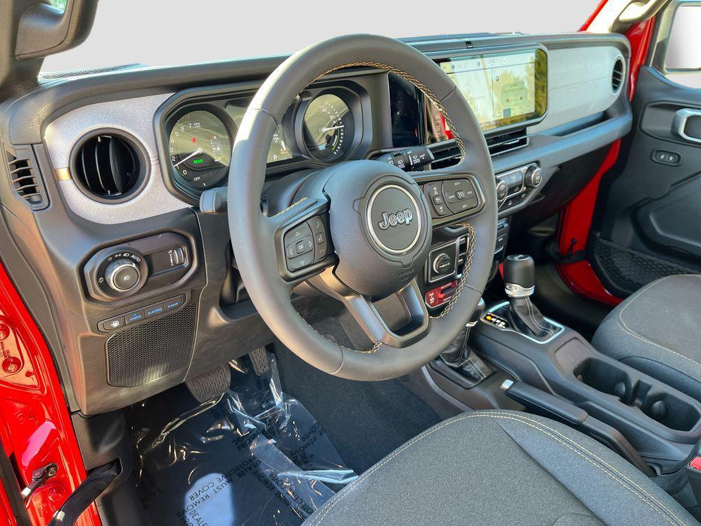 used 2024 Jeep Wrangler 4xe car, priced at $32,059