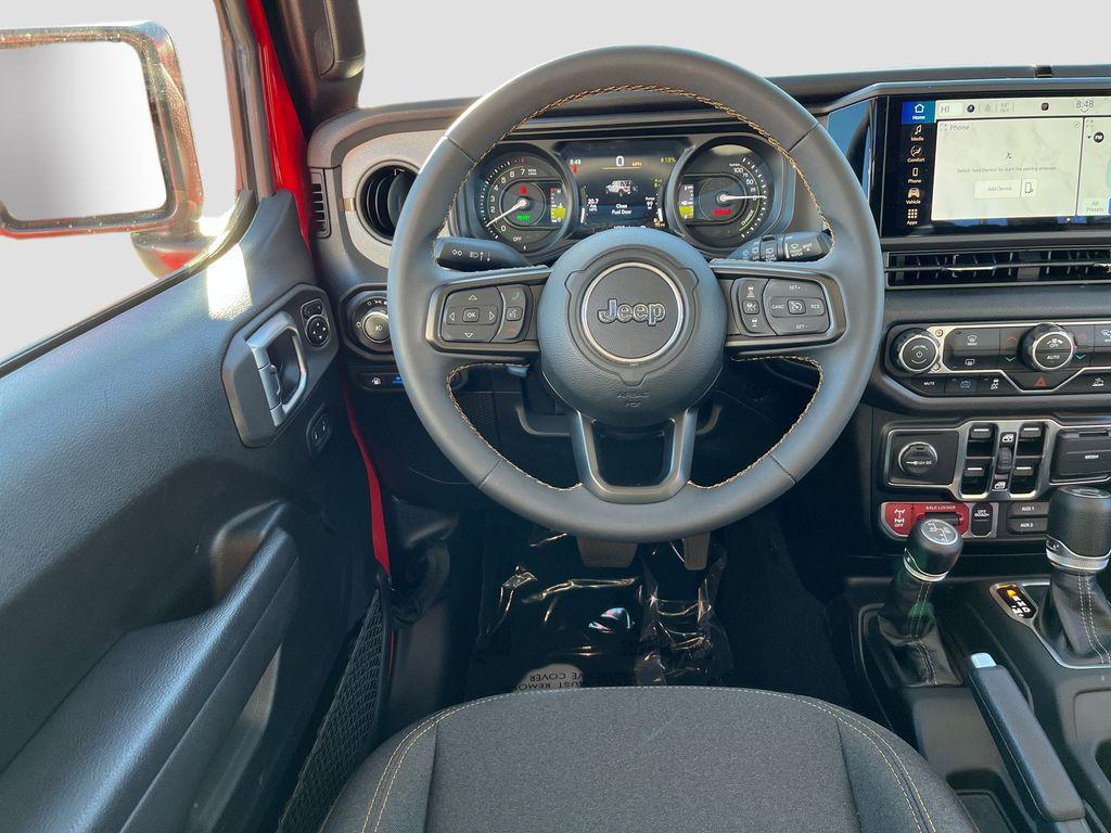 used 2024 Jeep Wrangler 4xe car, priced at $32,059