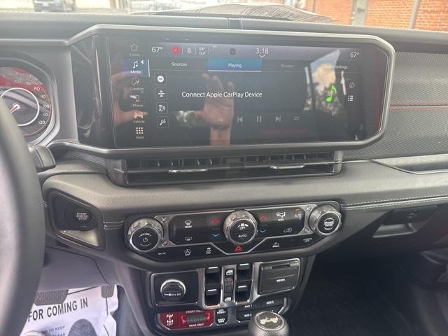 used 2024 Jeep Wrangler car, priced at $45,000