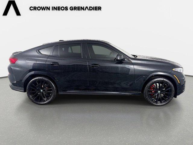 used 2025 BMW X6 car, priced at $73,458