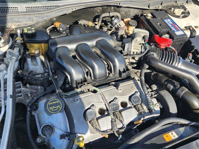 used 2007 Ford Fusion car, priced at $2,000