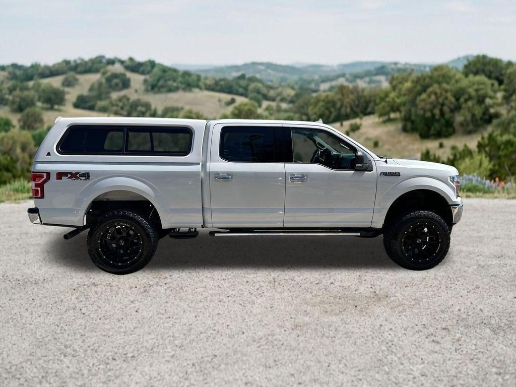 used 2018 Ford F-150 car, priced at $26,296