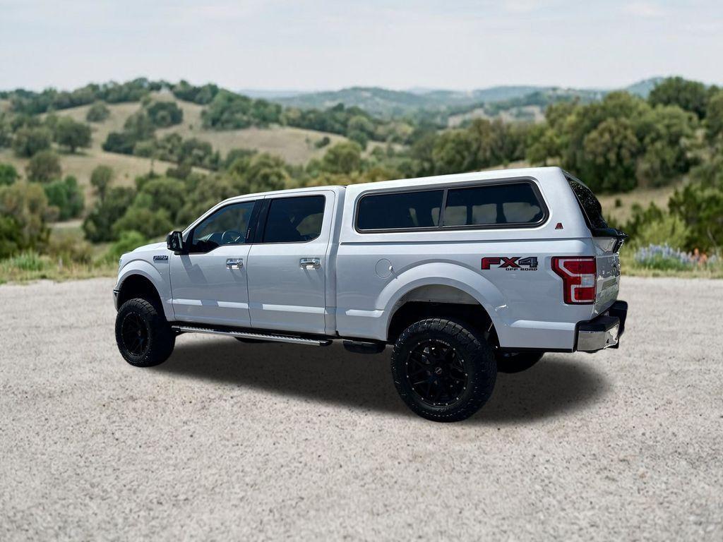 used 2018 Ford F-150 car, priced at $26,296