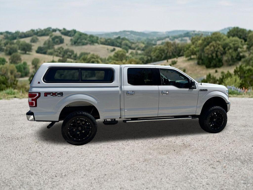 used 2018 Ford F-150 car, priced at $26,296