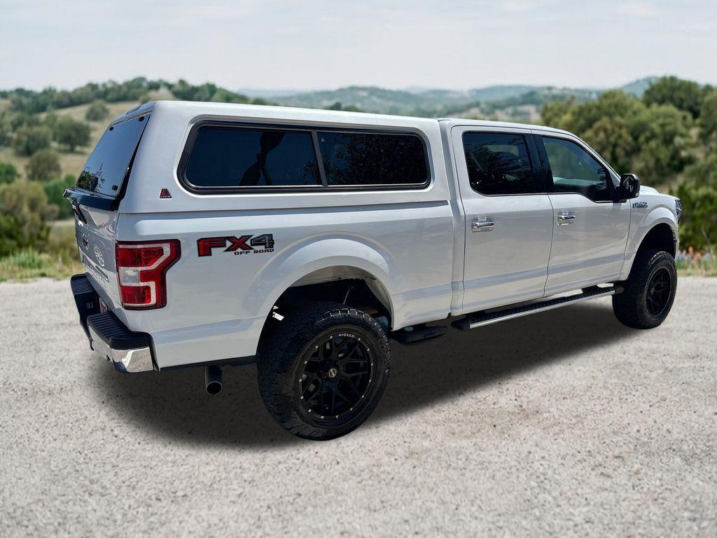 used 2018 Ford F-150 car, priced at $26,296