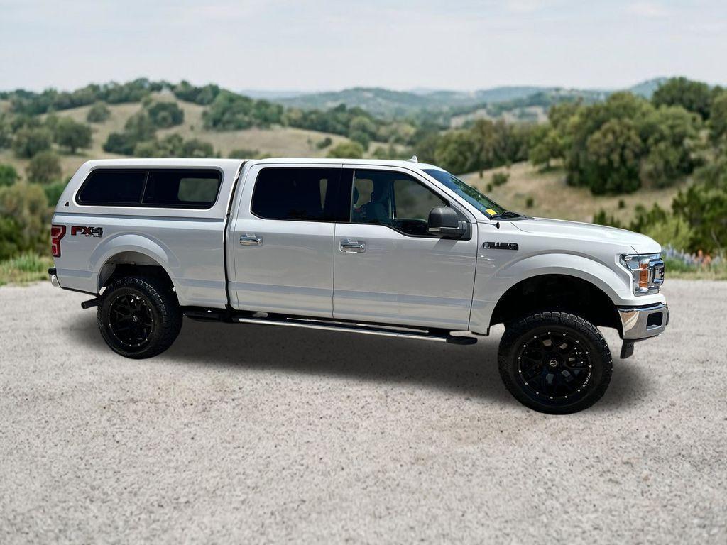 used 2018 Ford F-150 car, priced at $26,296