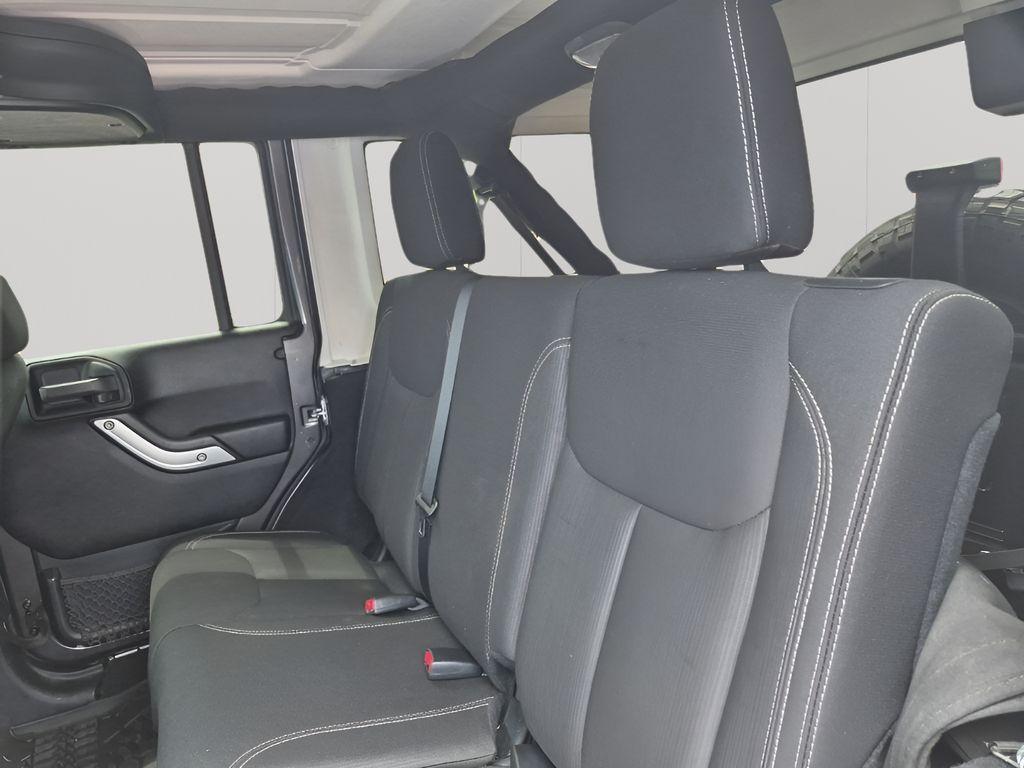 used 2016 Jeep Wrangler Unlimited car, priced at $26,457