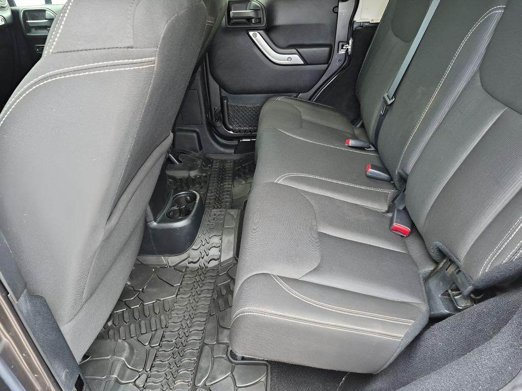 used 2016 Jeep Wrangler Unlimited car, priced at $26,457