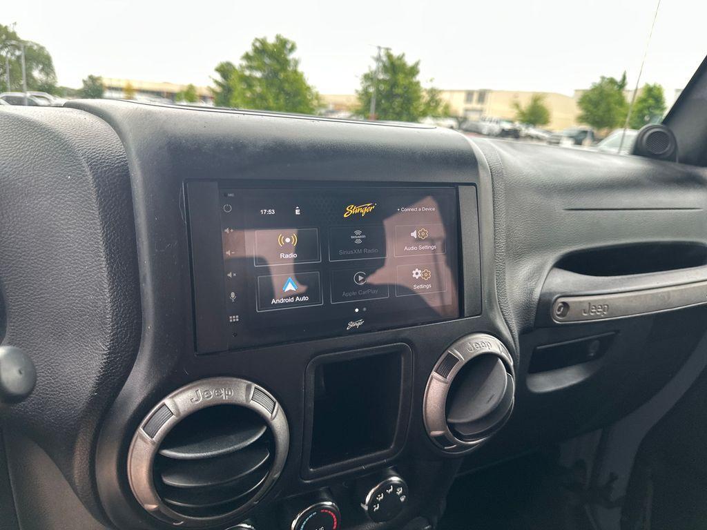 used 2014 Jeep Wrangler car, priced at $14,996