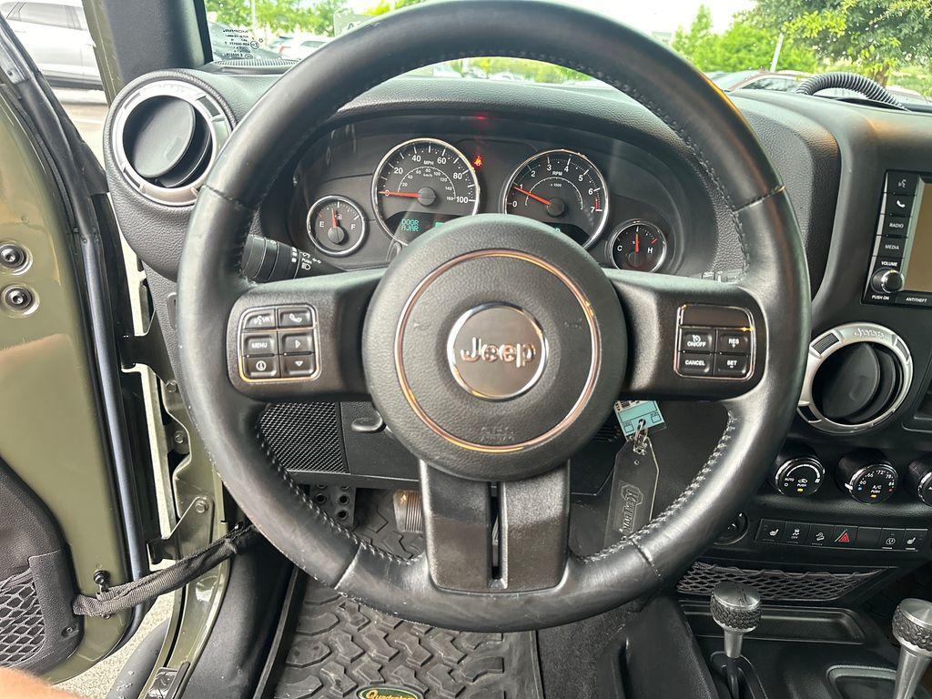 used 2016 Jeep Wrangler Unlimited car, priced at $26,517