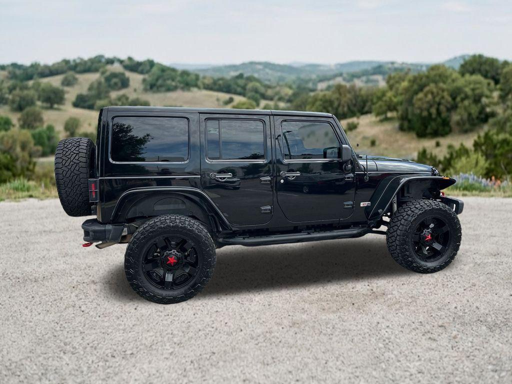 used 2013 Jeep Wrangler Unlimited car, priced at $21,282