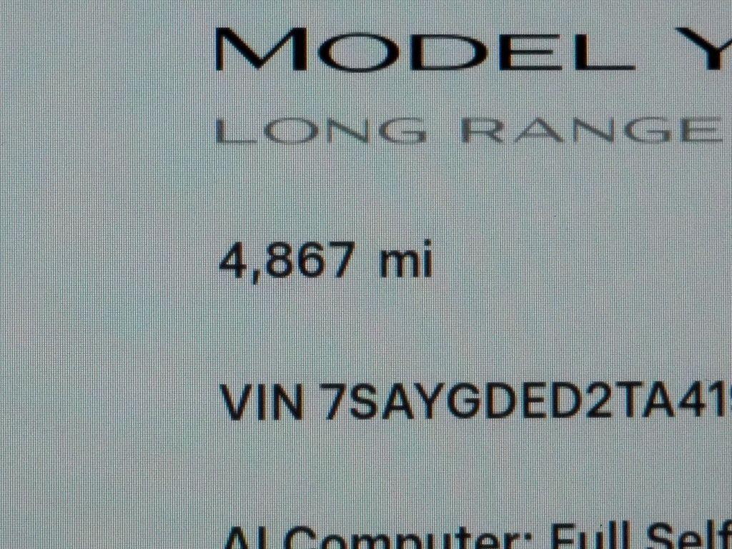 used 2026 Tesla Model Y car, priced at $48,175