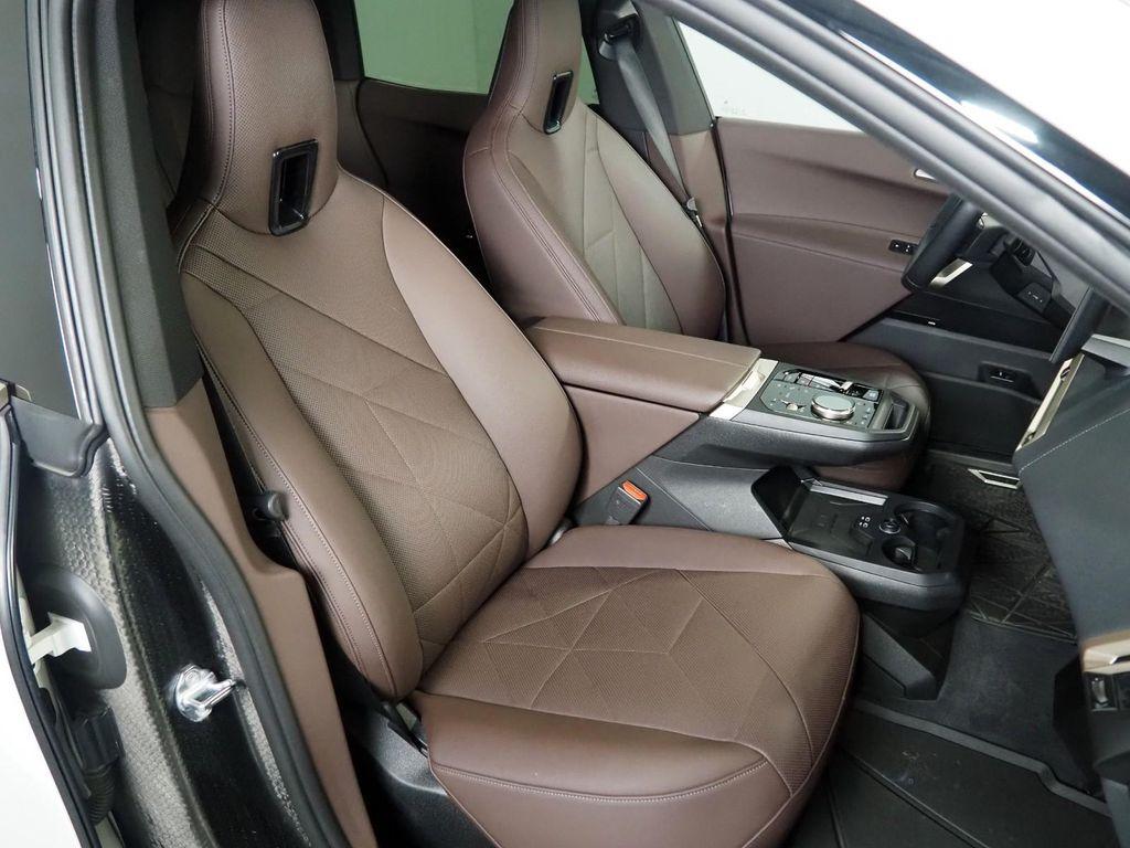 used 2024 BMW iX car, priced at $57,500