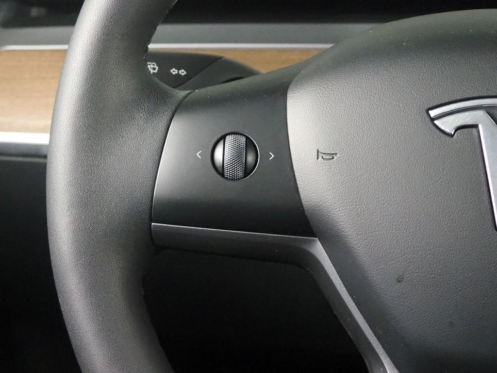 used 2023 Tesla Model 3 car, priced at $29,175