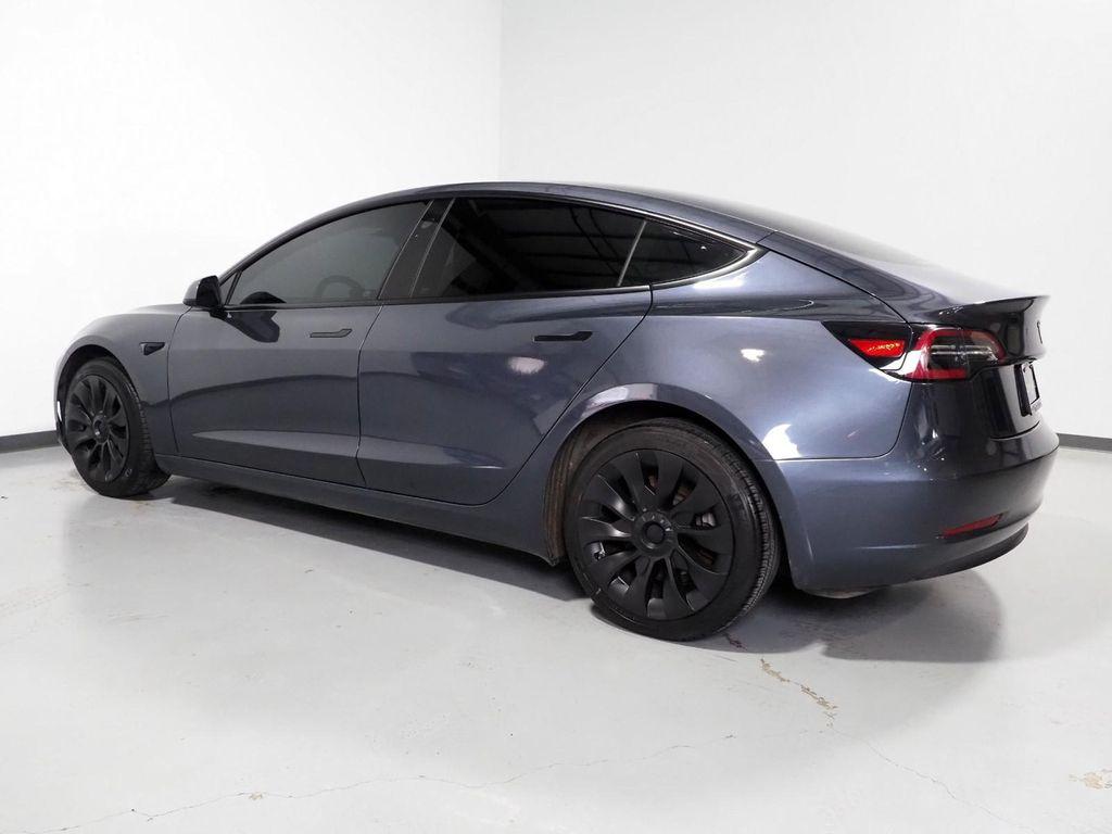 used 2023 Tesla Model 3 car, priced at $27,950