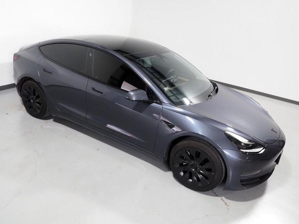 used 2023 Tesla Model 3 car, priced at $27,950