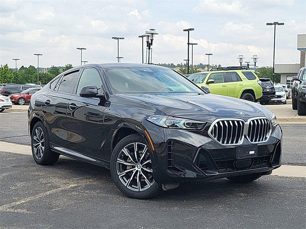 used 2025 BMW X6 car, priced at $67,398