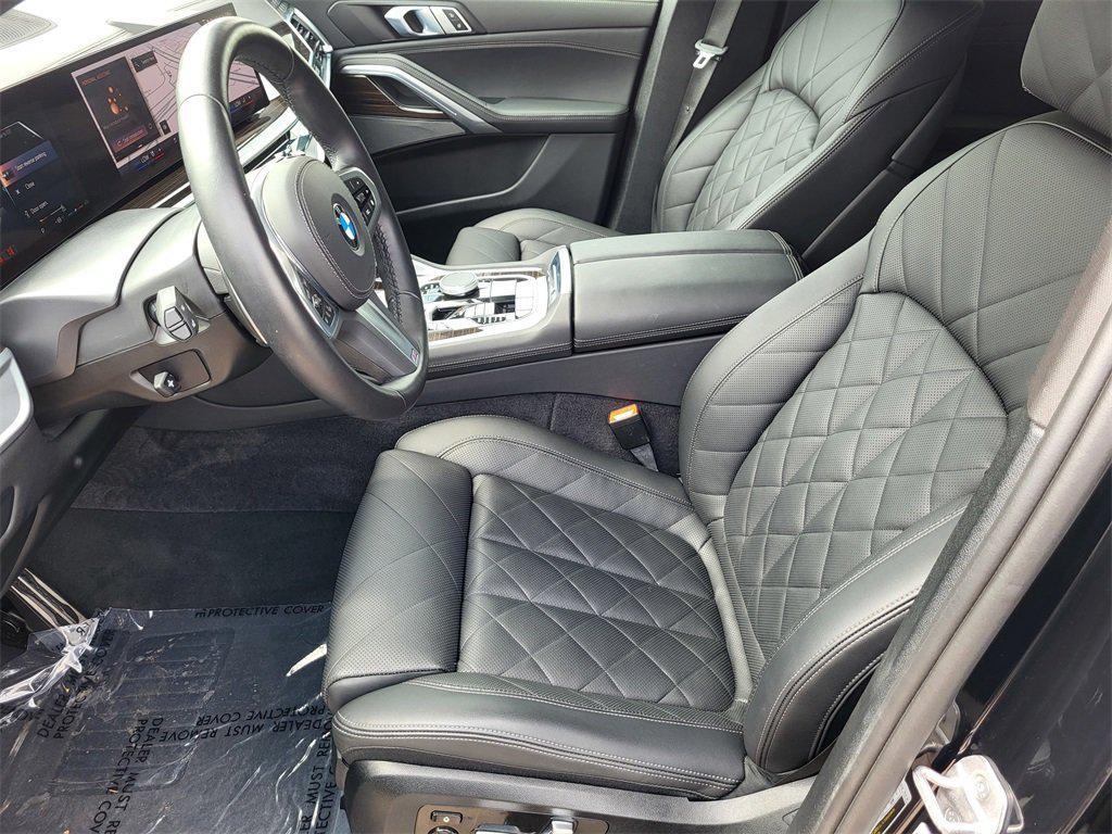 used 2025 BMW X6 car, priced at $67,398