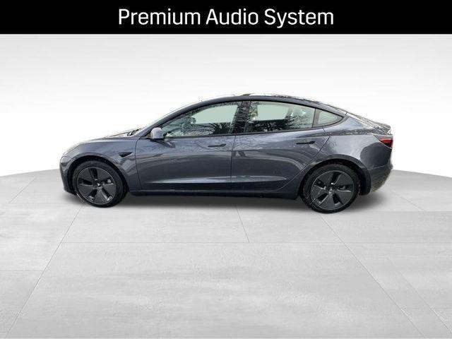 used 2023 Tesla Model 3 car, priced at $25,997