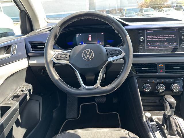 used 2023 Volkswagen Taos car, priced at $25,420