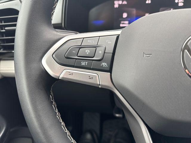 used 2025 Volkswagen Taos car, priced at $24,900