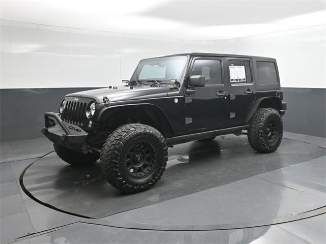 used 2014 Jeep Wrangler Unlimited car, priced at $15,182