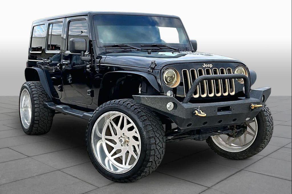 used 2014 Jeep Wrangler Unlimited car, priced at $25,225