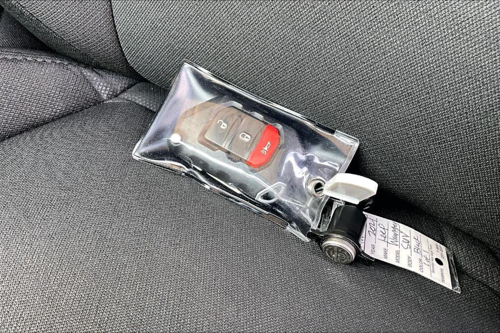 used 2021 Jeep Wrangler Unlimited car, priced at $26,211