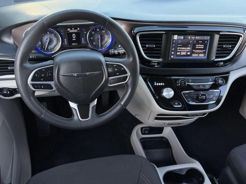 used 2023 Chrysler Voyager car, priced at $19,221