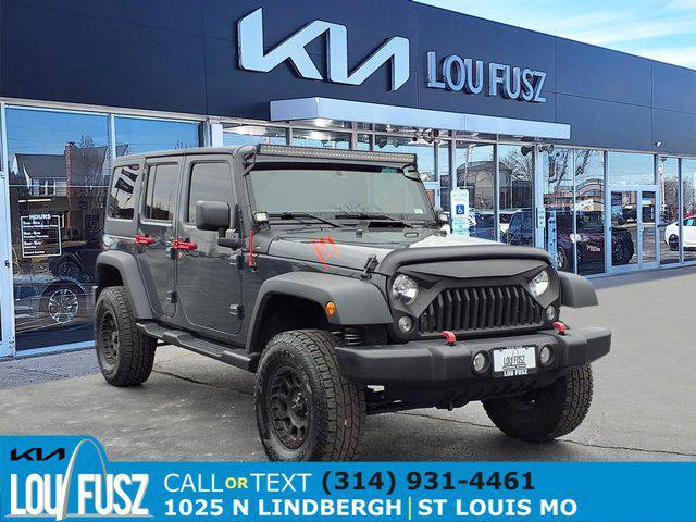 used 2018 Jeep Wrangler JK Unlimited car, priced at $19,492
