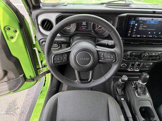 used 2025 Jeep Wrangler car, priced at $34,440