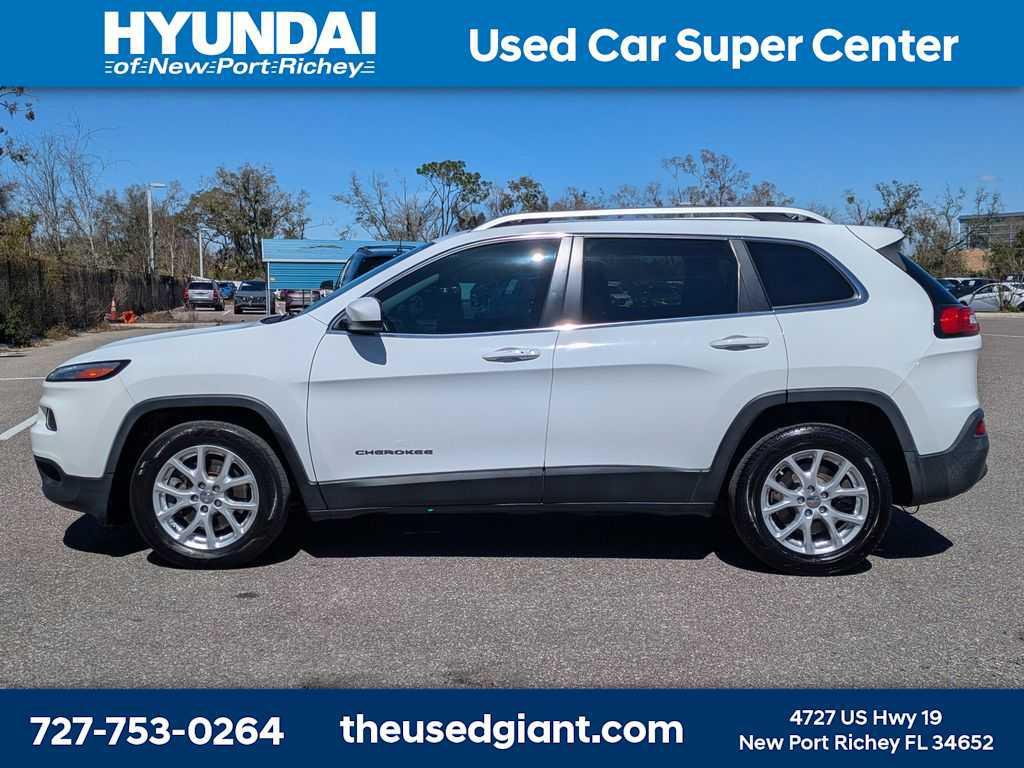 used 2014 Jeep Cherokee car, priced at $7,998