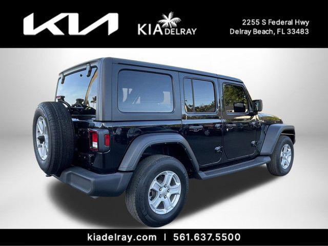 used 2023 Jeep Wrangler car, priced at $23,412