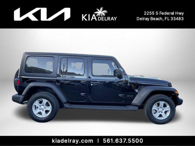 used 2023 Jeep Wrangler car, priced at $23,412
