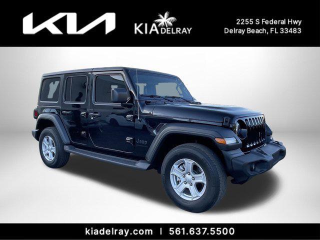 used 2023 Jeep Wrangler car, priced at $23,412