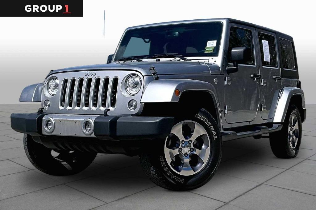 used 2018 Jeep Wrangler JK Unlimited car, priced at $20,624