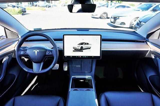used 2023 Tesla Model 3 car, priced at $34,471