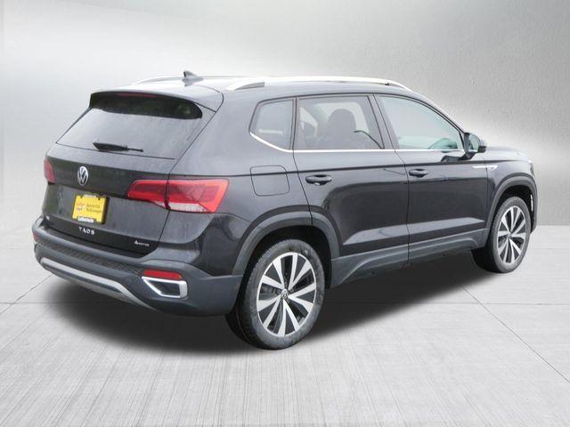 used 2023 Volkswagen Taos car, priced at $22,991