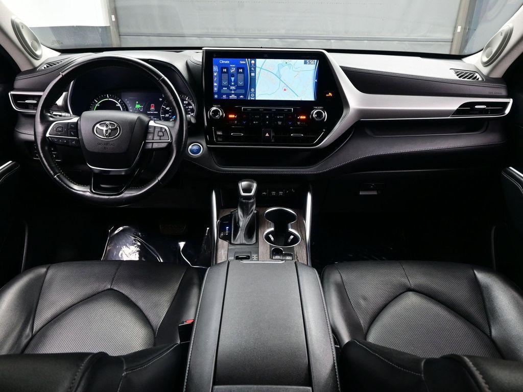 used 2021 Toyota Highlander Hybrid car, priced at $29,390