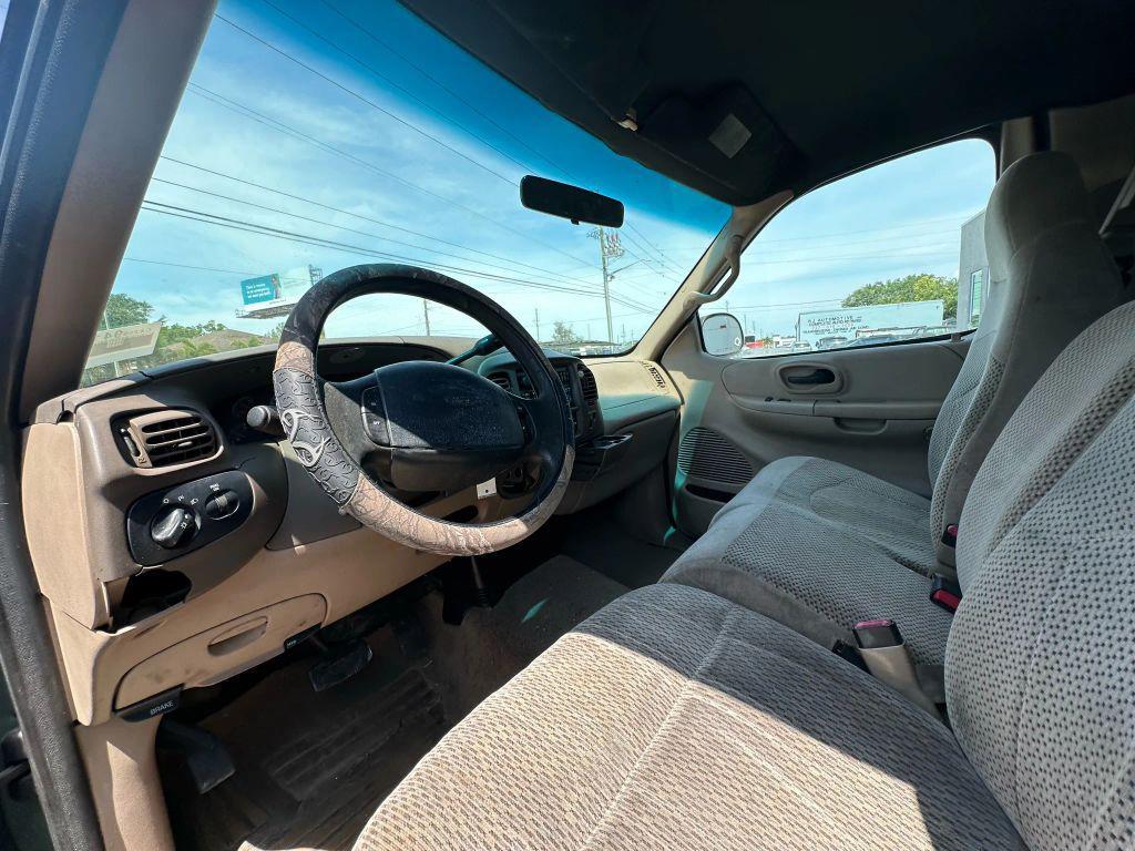 used 1999 Ford F-150 car, priced at $4,895