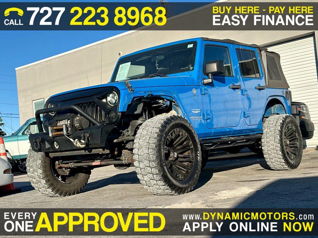used 2011 Jeep Wrangler Unlimited car, priced at $11,995
