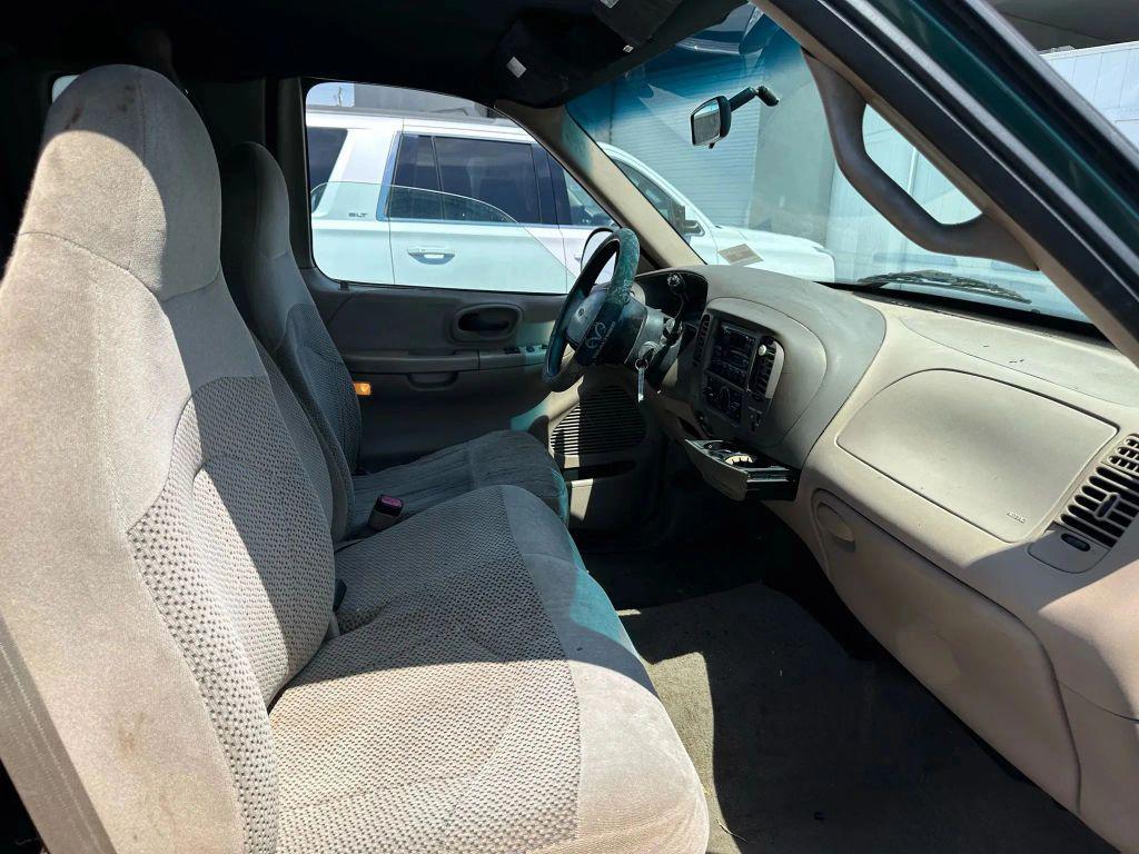 used 1999 Ford F-150 car, priced at $4,995