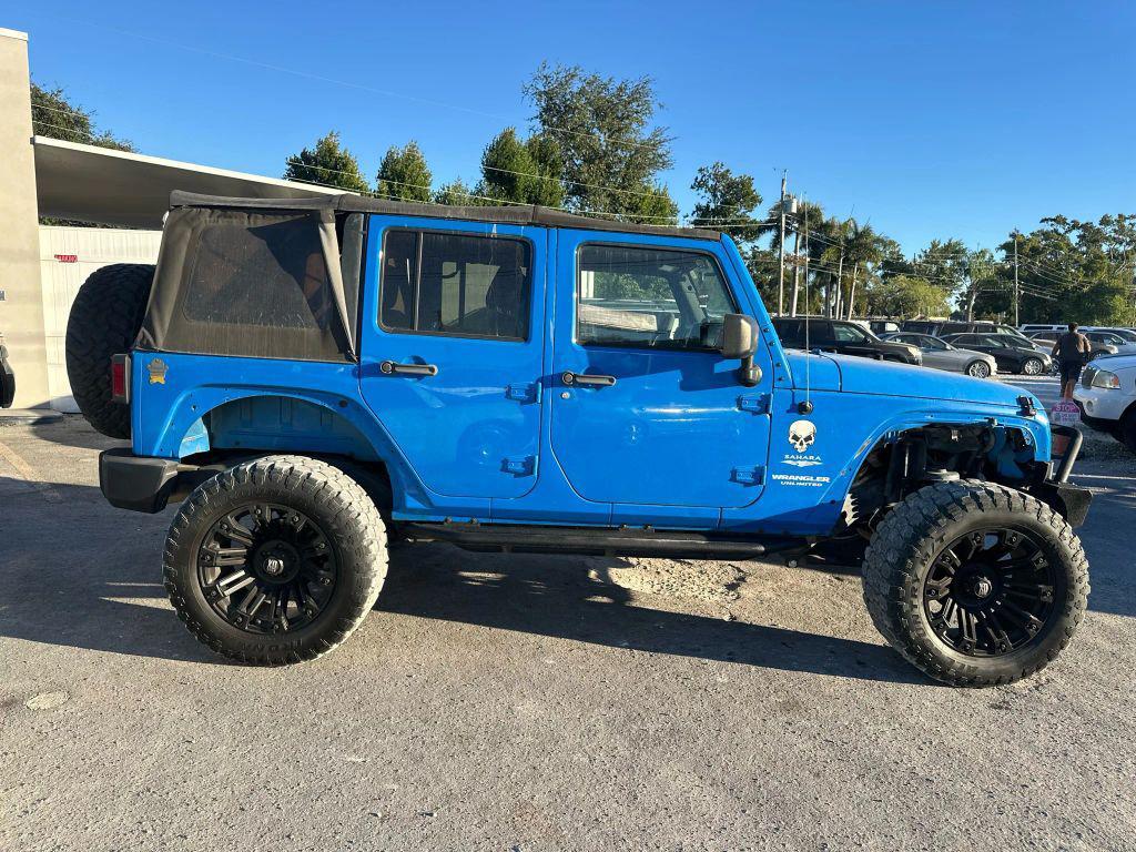 used 2011 Jeep Wrangler Unlimited car, priced at $14,995