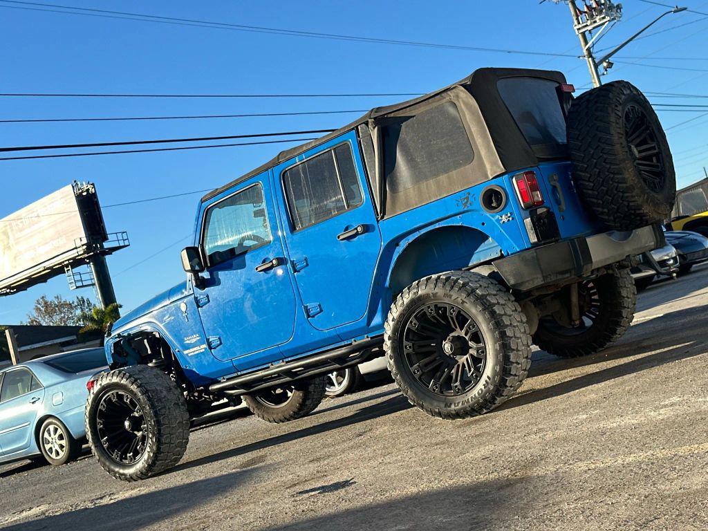 used 2011 Jeep Wrangler Unlimited car, priced at $14,995